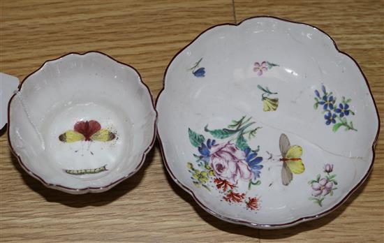 A Chelsea red anchor fluted teabowl and saucer, c.1755, polychrome painted with flowers and insects (saucer cracked)